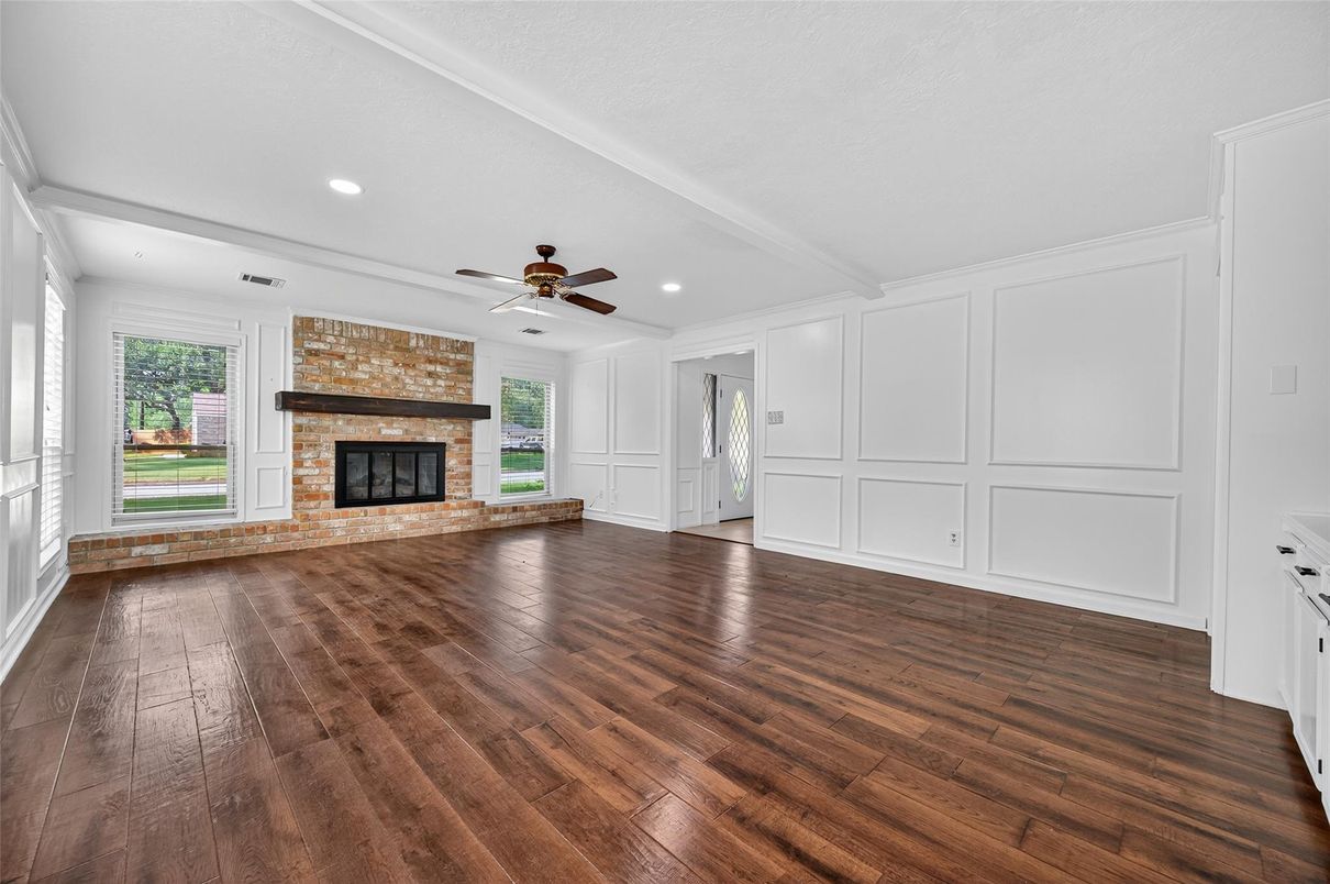 Empty room, Fireplace, Interior, Recessed Lighting, Stone Walls, Wood Texture Flooring