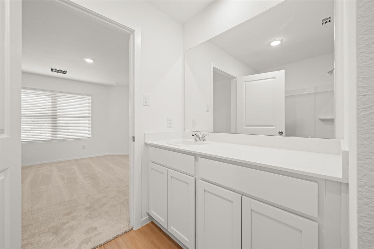 Bathroom, Dual Sink Vanities, Interior, Recessed Lighting, Wood Texture Flooring