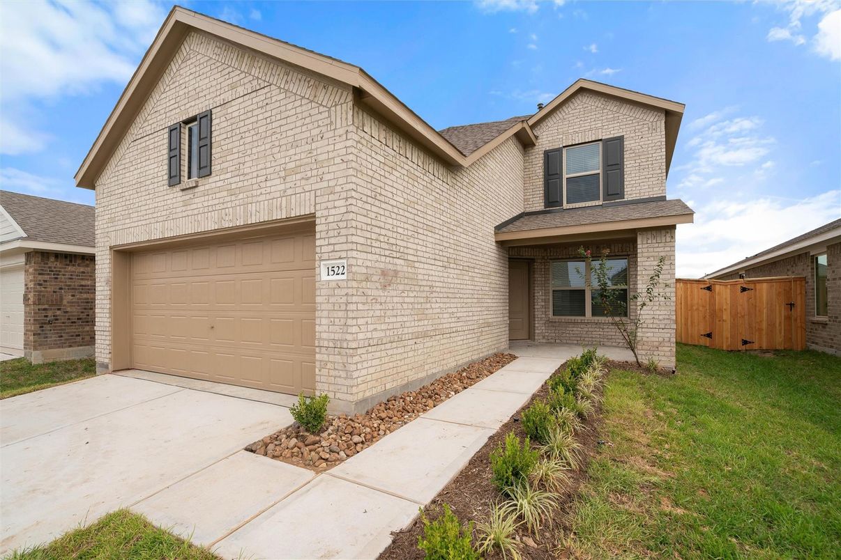Attached, Exterior, Facade, Brick Facade, Brick Traditional
