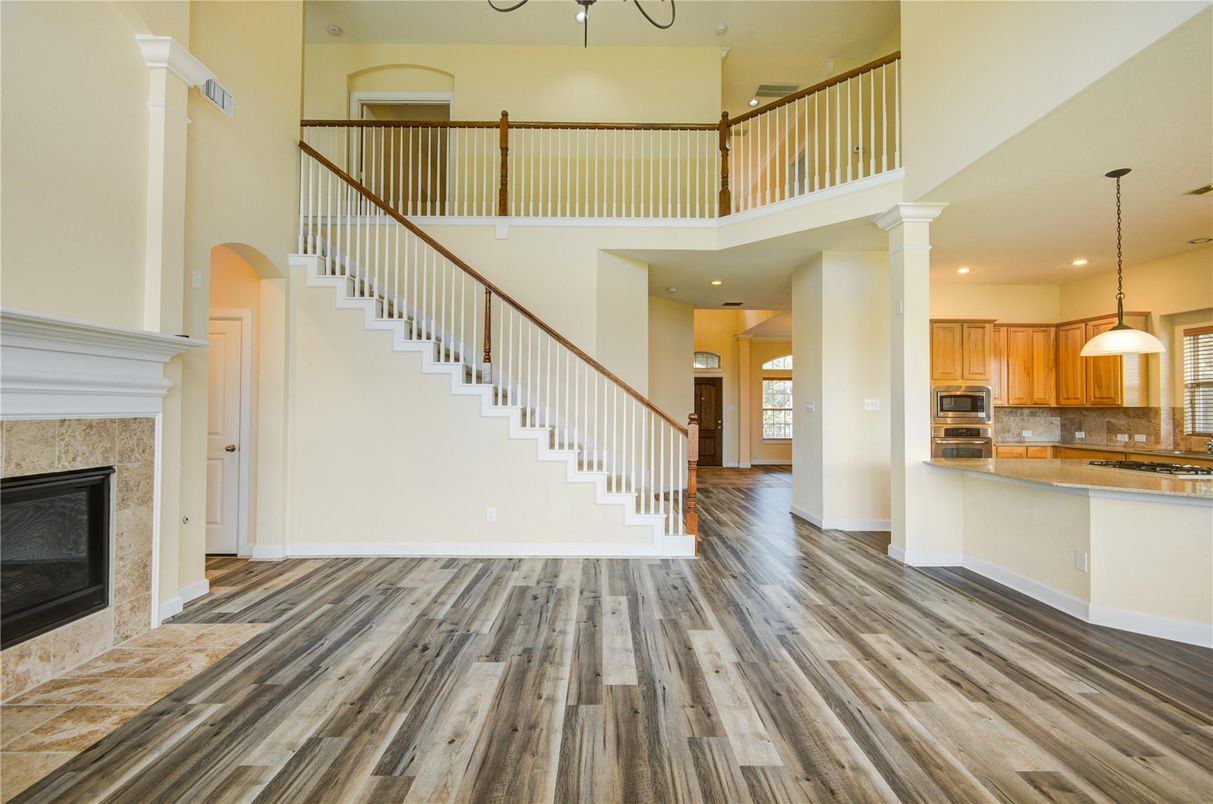 Fireplace, Interior, Kitchen, Pendant Lights, Recessed Lighting, Wood Texture Flooring