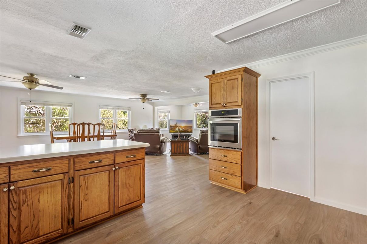 Dining room, Interior, Kitchen, Living room, Stainless Steel Appliances, Wood Texture Flooring