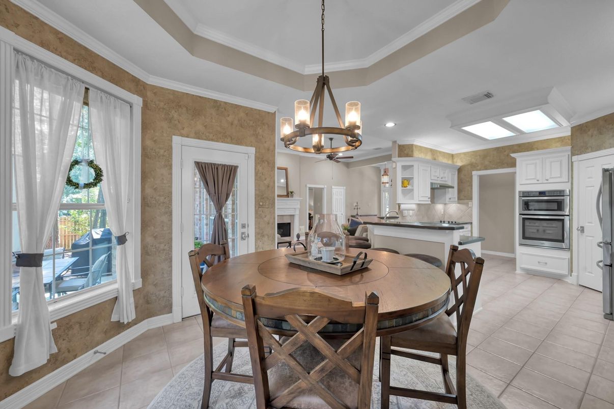 Chandelier, Dining room, Fireplace, Interior, Kitchen, Pendant Lights, Recessed Lighting, Stainless Steel Appliances