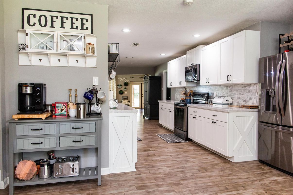 Interior, Kitchen, Recessed Lighting, Stainless Steel Appliances, Wood Texture Flooring