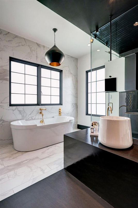 Bathroom, Dual Sink Vanities, Free Standing Baths, Interior, Marble, Marble Walls, Pendant Lights, Recessed Lighting