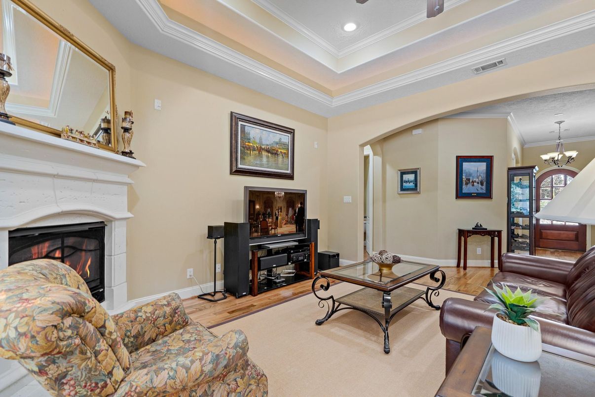 Chandelier, Fireplace, Interior, Living room, Recessed Lighting, Wood Texture Flooring