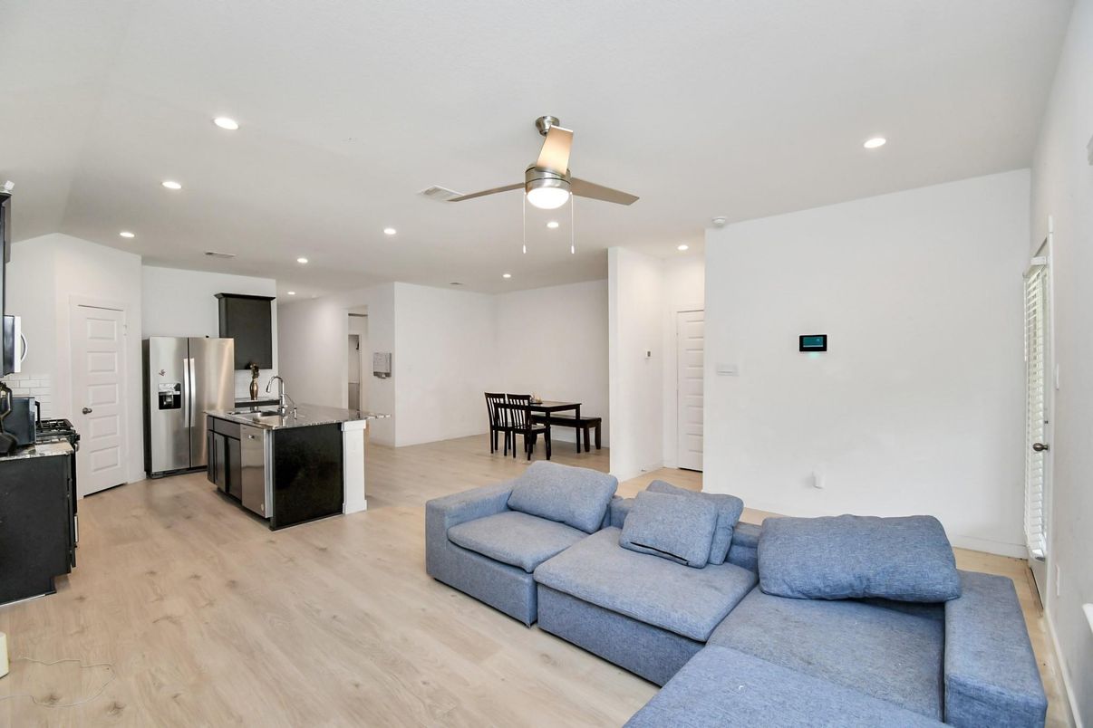 Dining room, Interior, Kitchen, Living room, Recessed Lighting, Stainless Steel Appliances, Wood Texture Flooring