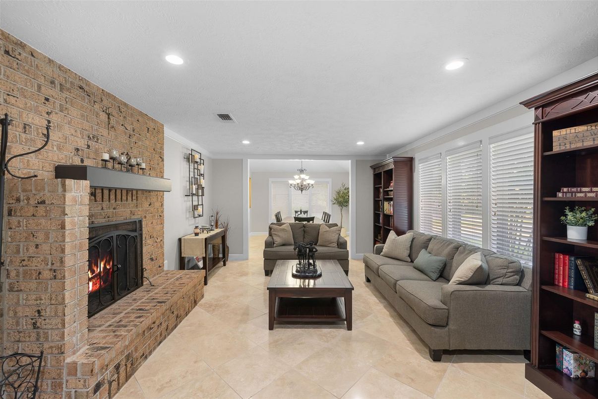 Chandelier, Fireplace, Interior, Living room, Recessed Lighting, Stone Walls