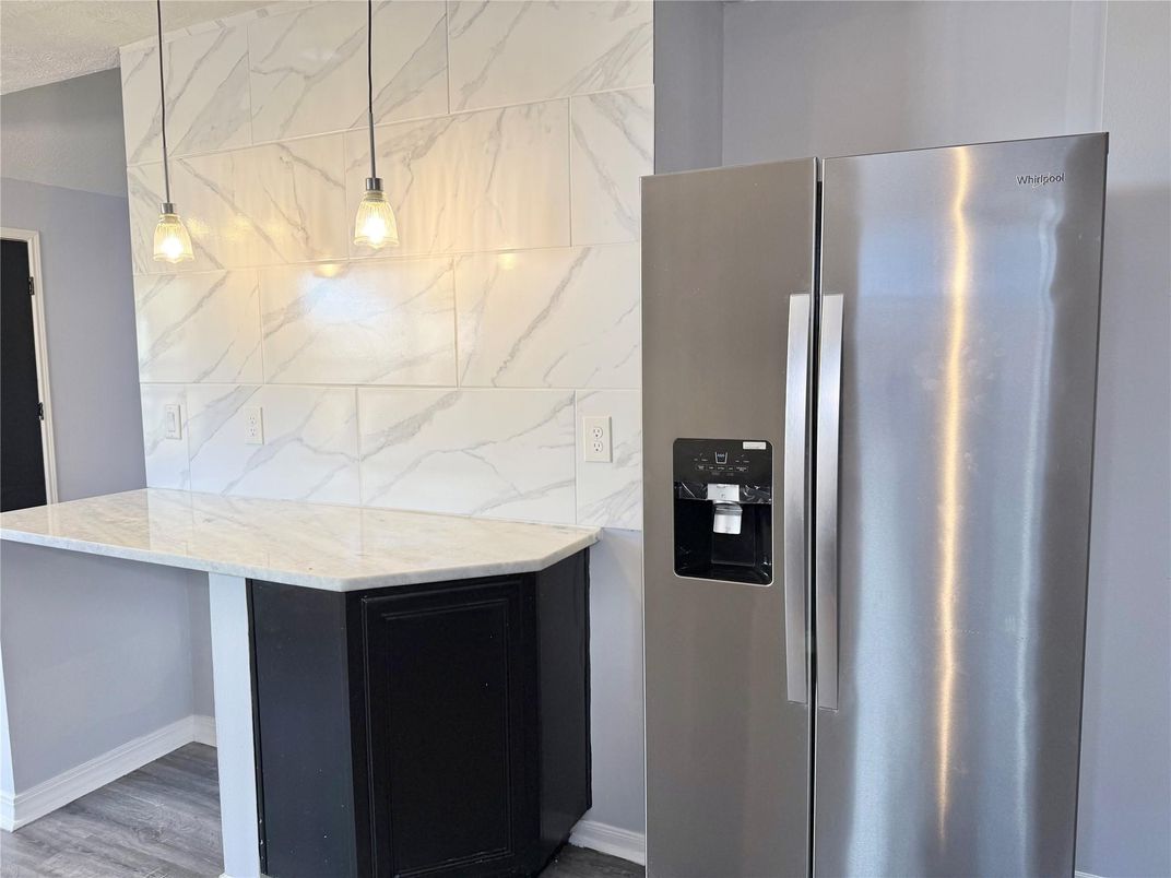 Interior, Kitchen, Marble Walls, Pendant Lights, Stainless Steel Appliances, Wood Texture Flooring