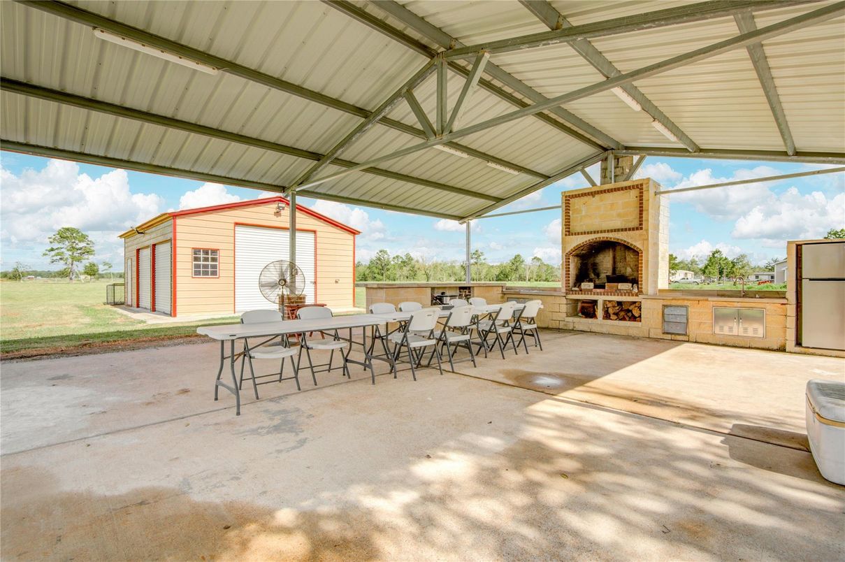 Exterior, Fireplace, Outdoor Kitchen