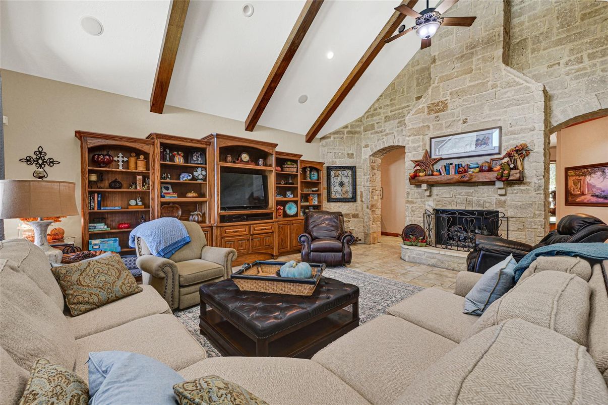 Fireplace, Interior, Living room, Recessed Lighting, Stone Walls, Wooden Beams