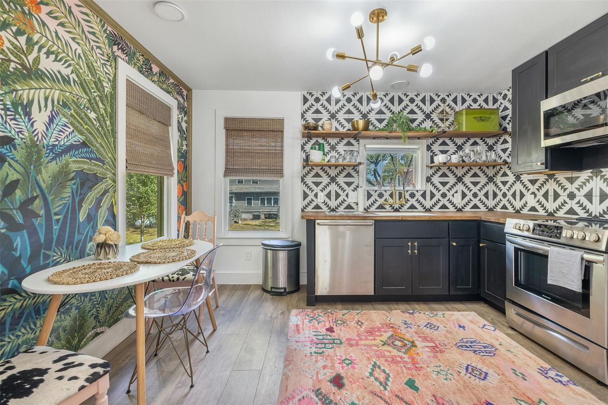 Dining room, Interior, Kitchen, Pendant Lights, Stainless Steel Appliances, Wood Texture Flooring
