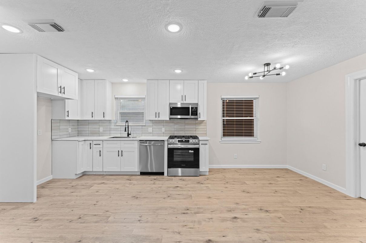 Interior, Kitchen, Recessed Lighting, Stainless Steel Appliances, Wood Texture Flooring