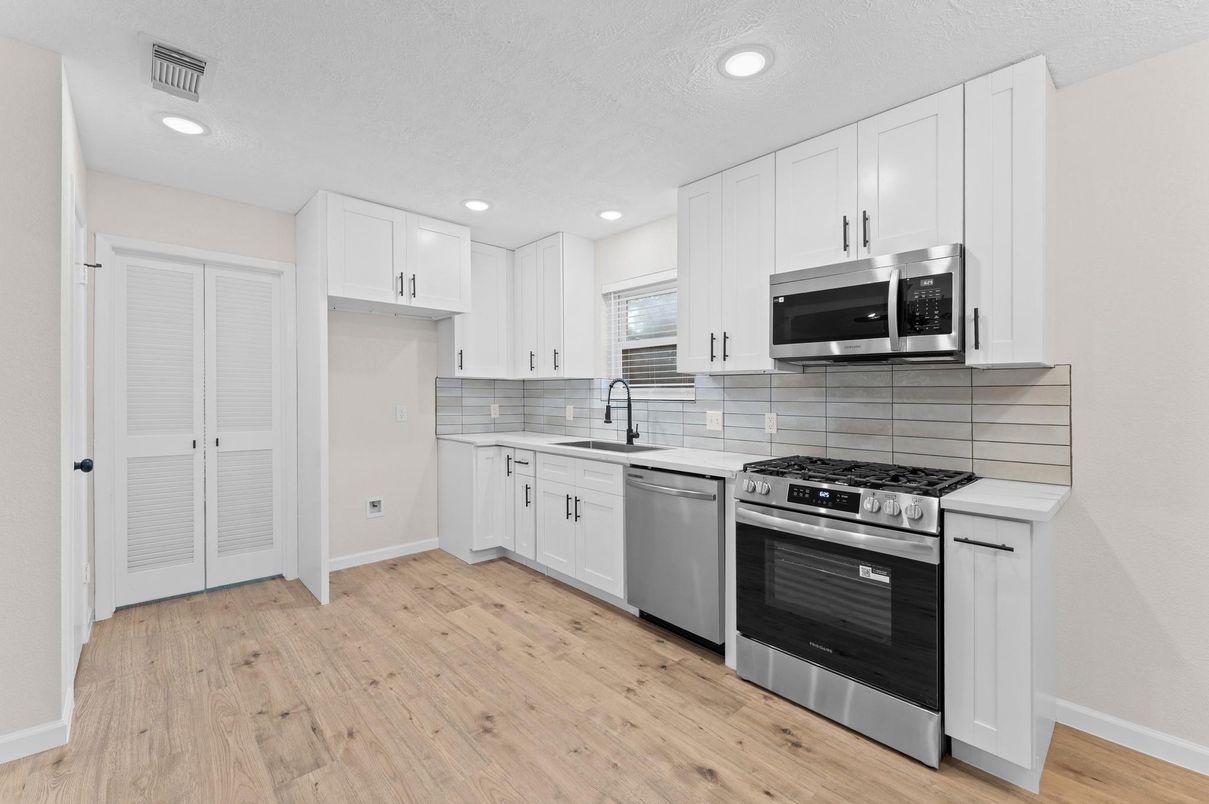 Interior, Kitchen, Recessed Lighting, Stainless Steel Appliances, Wood Texture Flooring