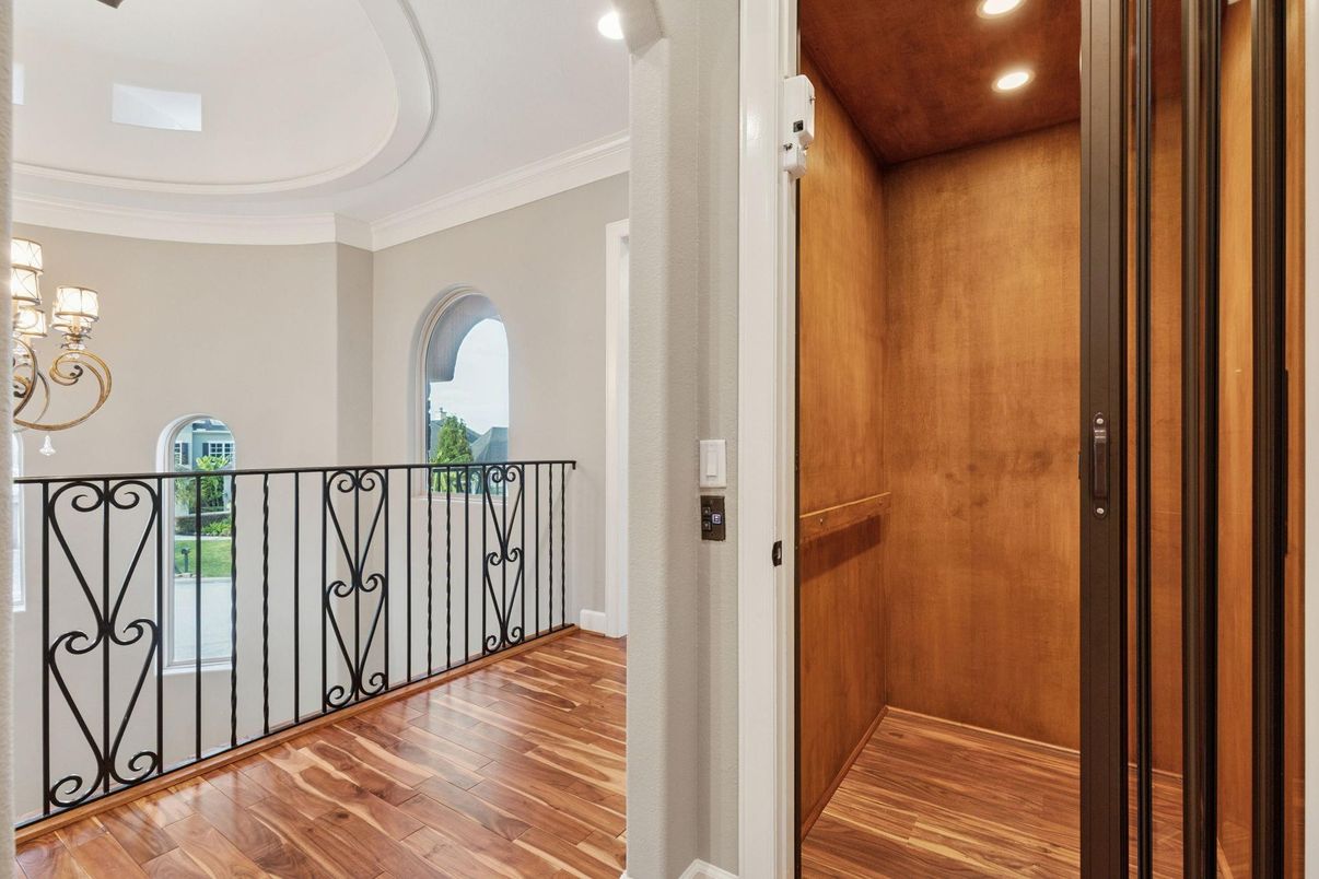 Elevator, Interior, Recessed Lighting, Wood Texture Flooring, Wooden Walls