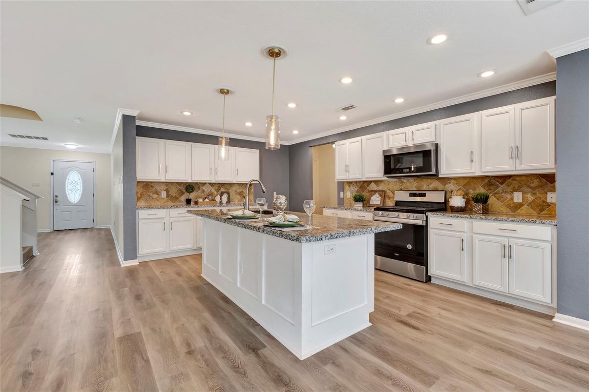 Interior, Kitchen, Pendant Lights, Recessed Lighting, Stainless Steel Appliances, Wood Texture Flooring