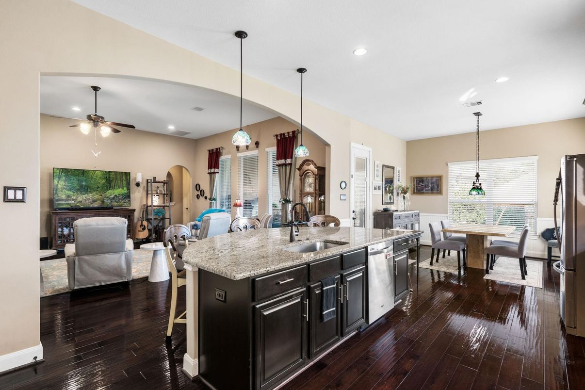 Dining room, Interior, Kitchen, Living room, Pendant Lights, Recessed Lighting, Stainless Steel Appliances, Wood Texture Flooring