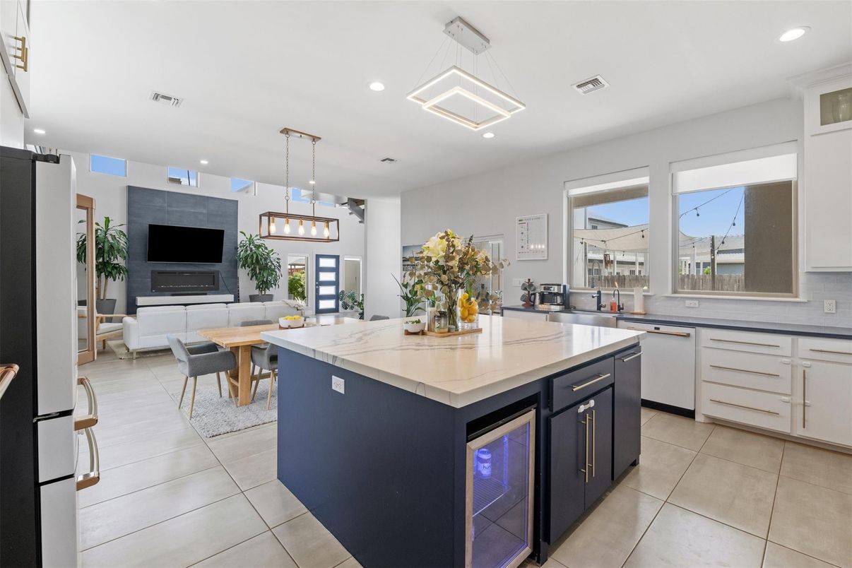 Dining room, Fireplace, Interior, Kitchen, Pendant Lights, Recessed Lighting, Stainless Steel Appliances
