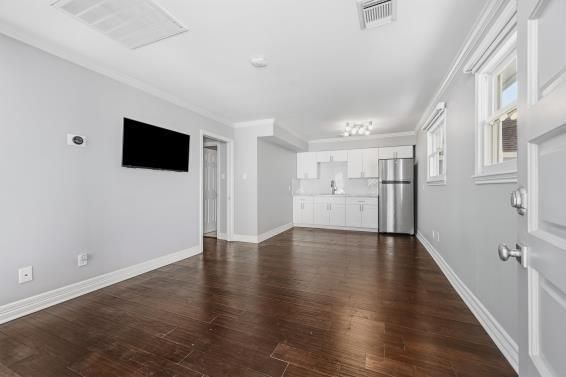 Empty room, Interior, Kitchen, Stainless Steel Appliances, Wood Texture Flooring