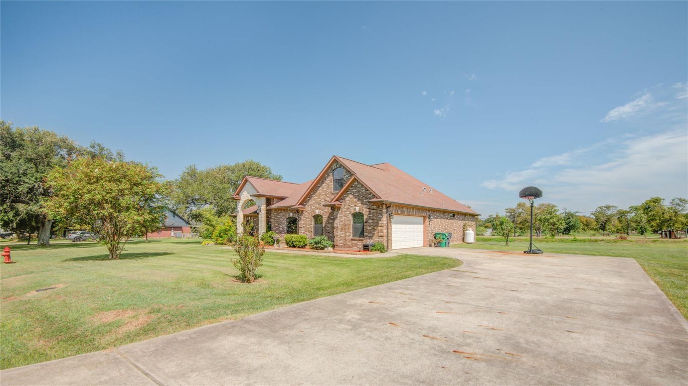 Attached, Backyard, Exterior, Facade, Brick Facade, Ranch