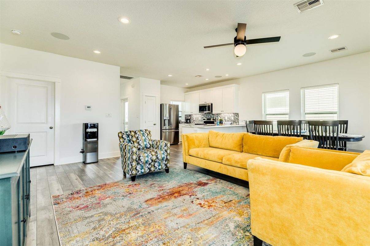 Dining room, Interior, Kitchen, Living room, Recessed Lighting, Stainless Steel Appliances, Wood Texture Flooring