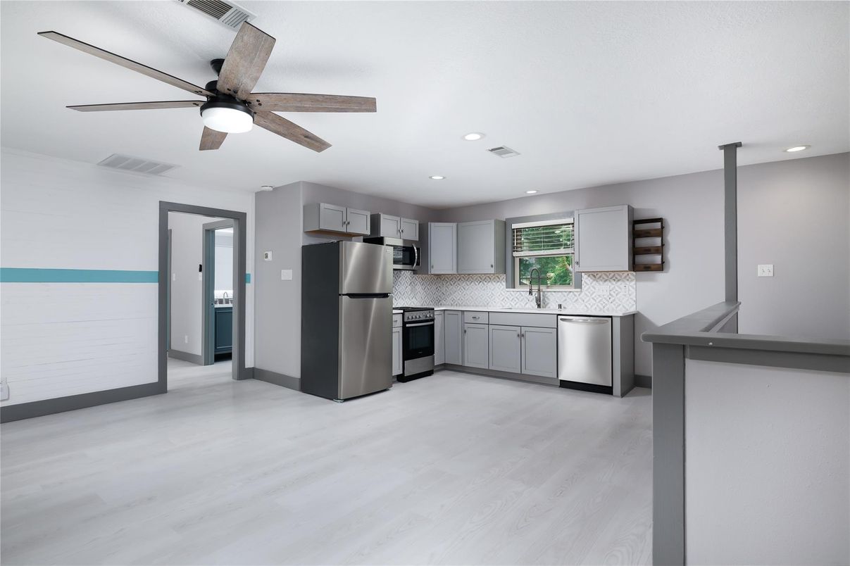 Interior, Kitchen, Recessed Lighting, Stainless Steel Appliances, Wood Texture Flooring
