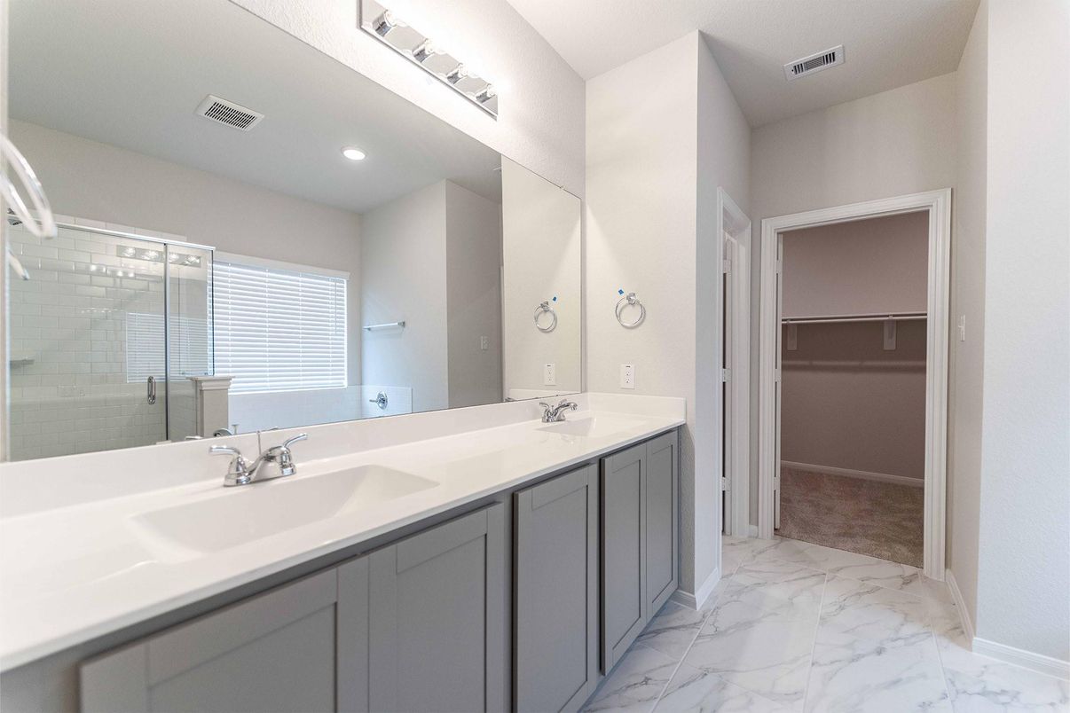 Bathroom, Dual Sink Vanities, Glass Shower, Interior, Marble, Recessed Lighting, Walk-in Closets