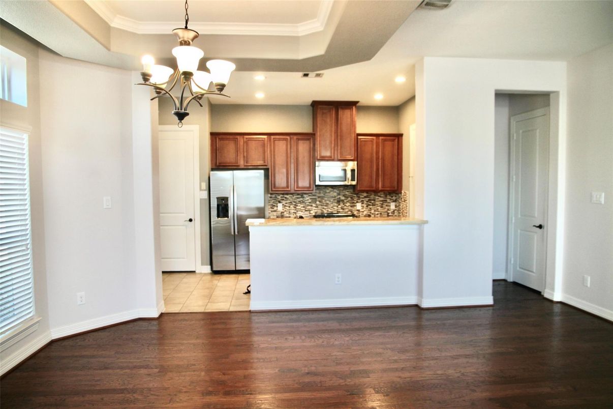 Chandelier, Interior, Kitchen, Recessed Lighting, Stainless Steel Appliances, Wood Texture Flooring