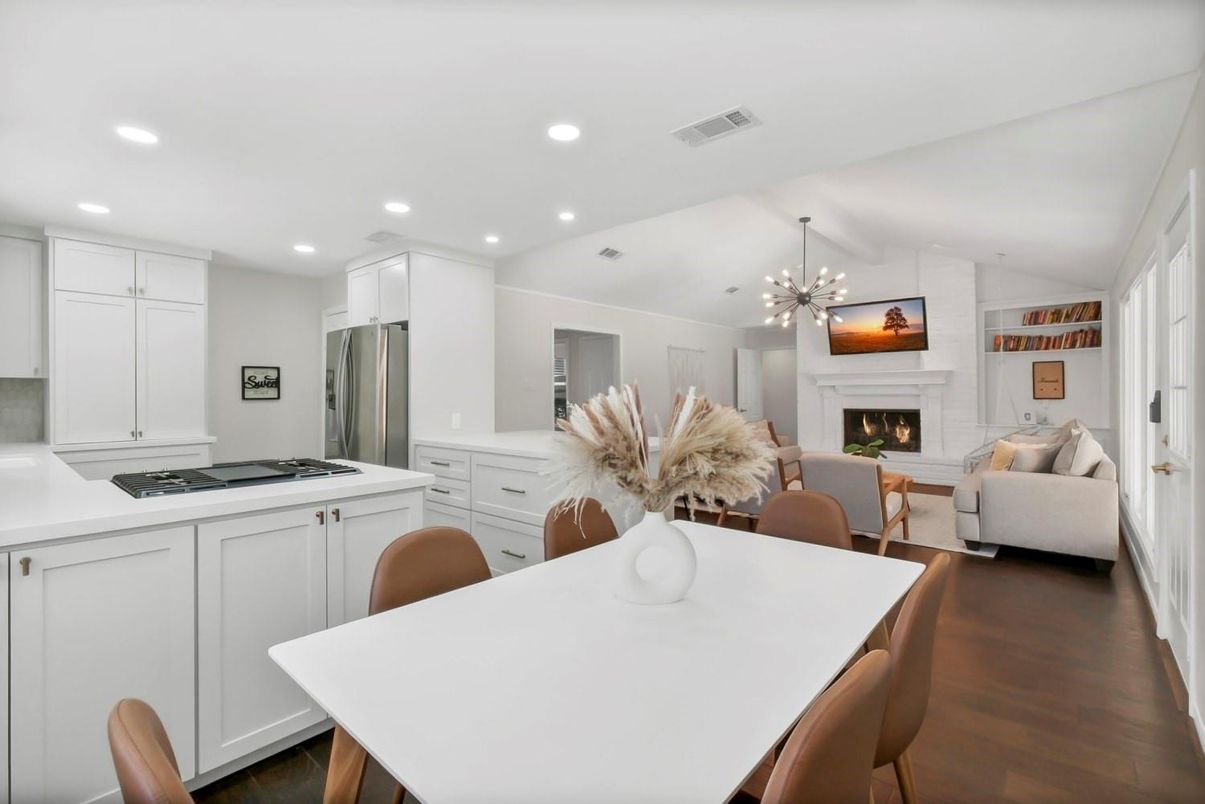 Dining room, Fireplace, Interior, Kitchen, Living room, Pendant Lights, Recessed Lighting, Stainless Steel Appliances, Wood Texture Flooring