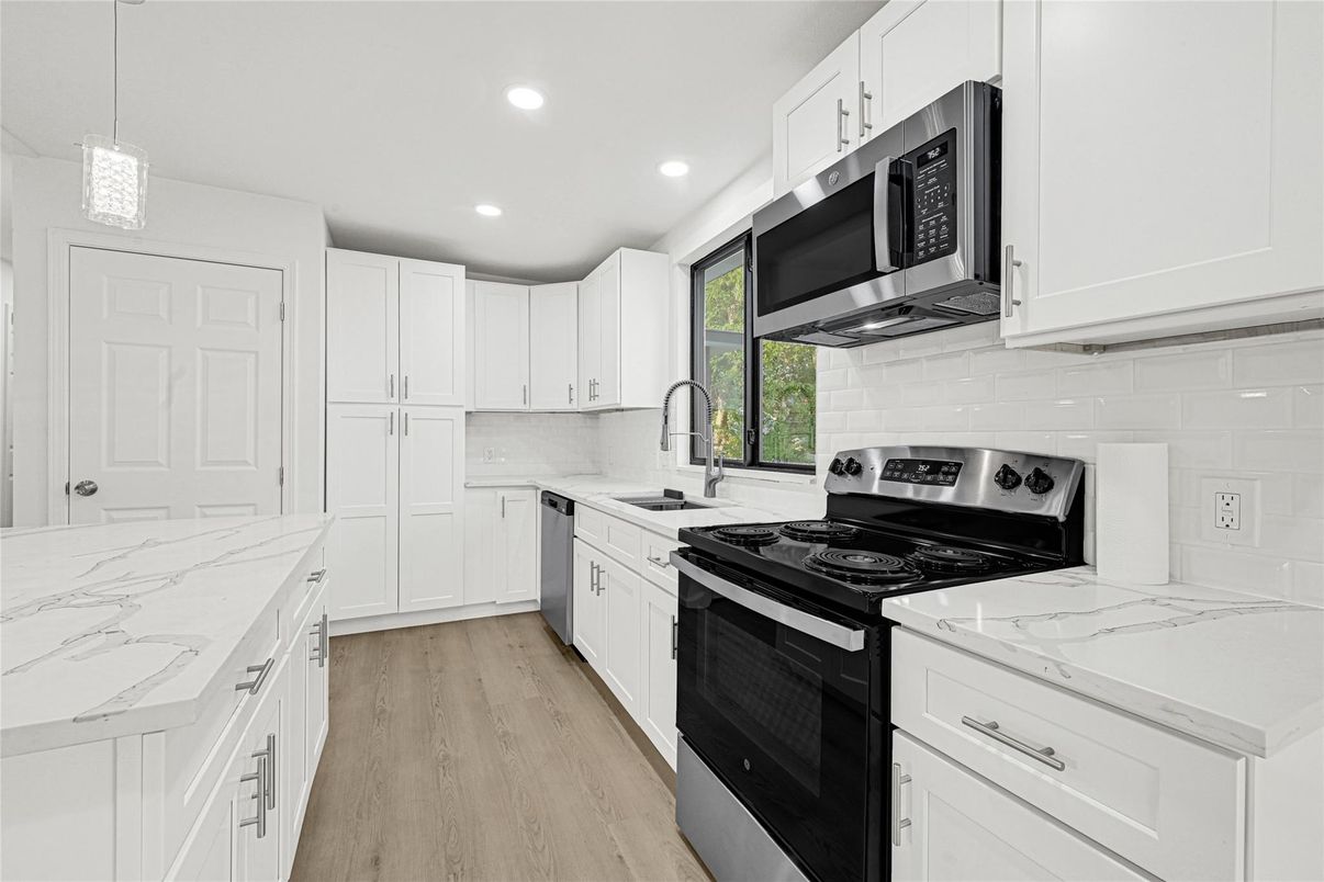 Interior, Kitchen, Pendant Lights, Recessed Lighting, Stainless Steel Appliances, Wood Texture Flooring