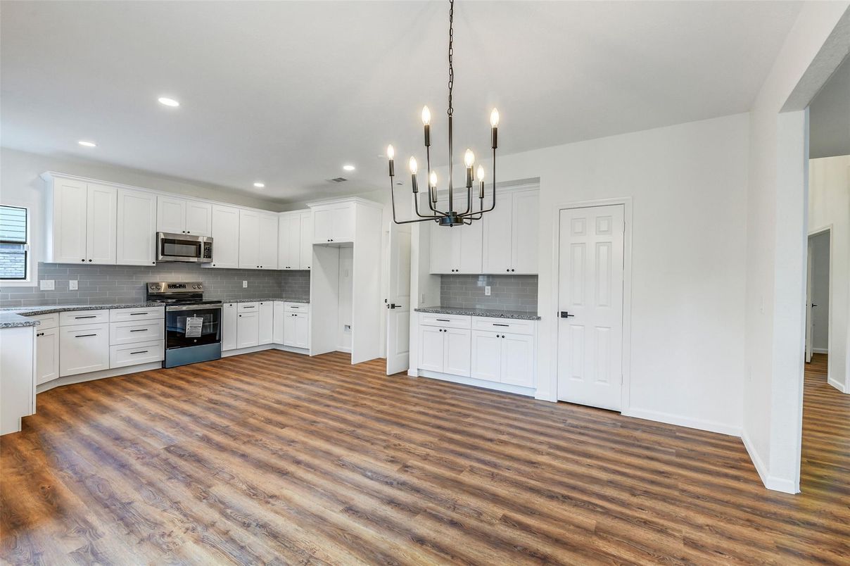 Interior, Kitchen, Pendant Lights, Recessed Lighting, Stainless Steel Appliances, Wood Texture Flooring