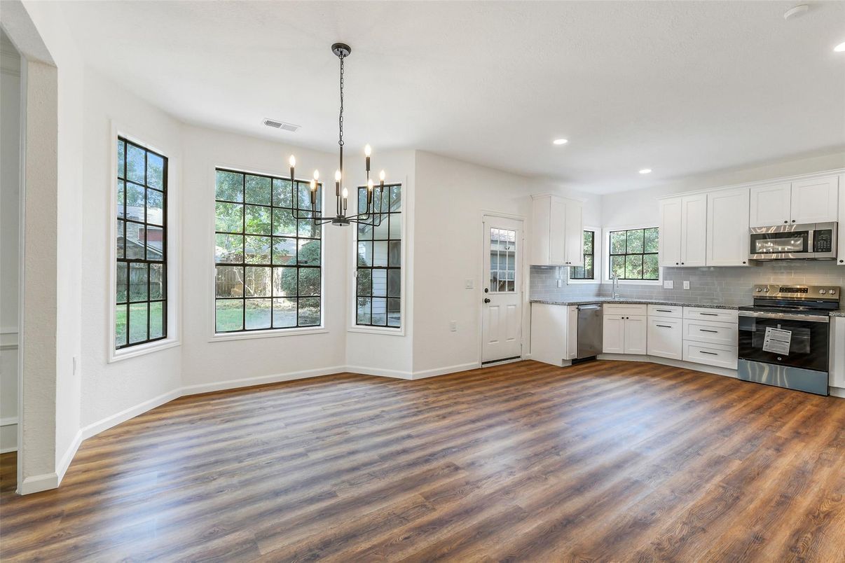 Interior, Kitchen, Pendant Lights, Recessed Lighting, Stainless Steel Appliances, Wood Texture Flooring