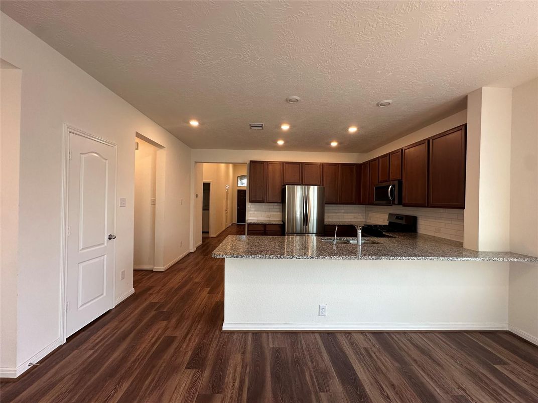 Interior, Kitchen, Recessed Lighting, Stainless Steel Appliances, Wood Texture Flooring