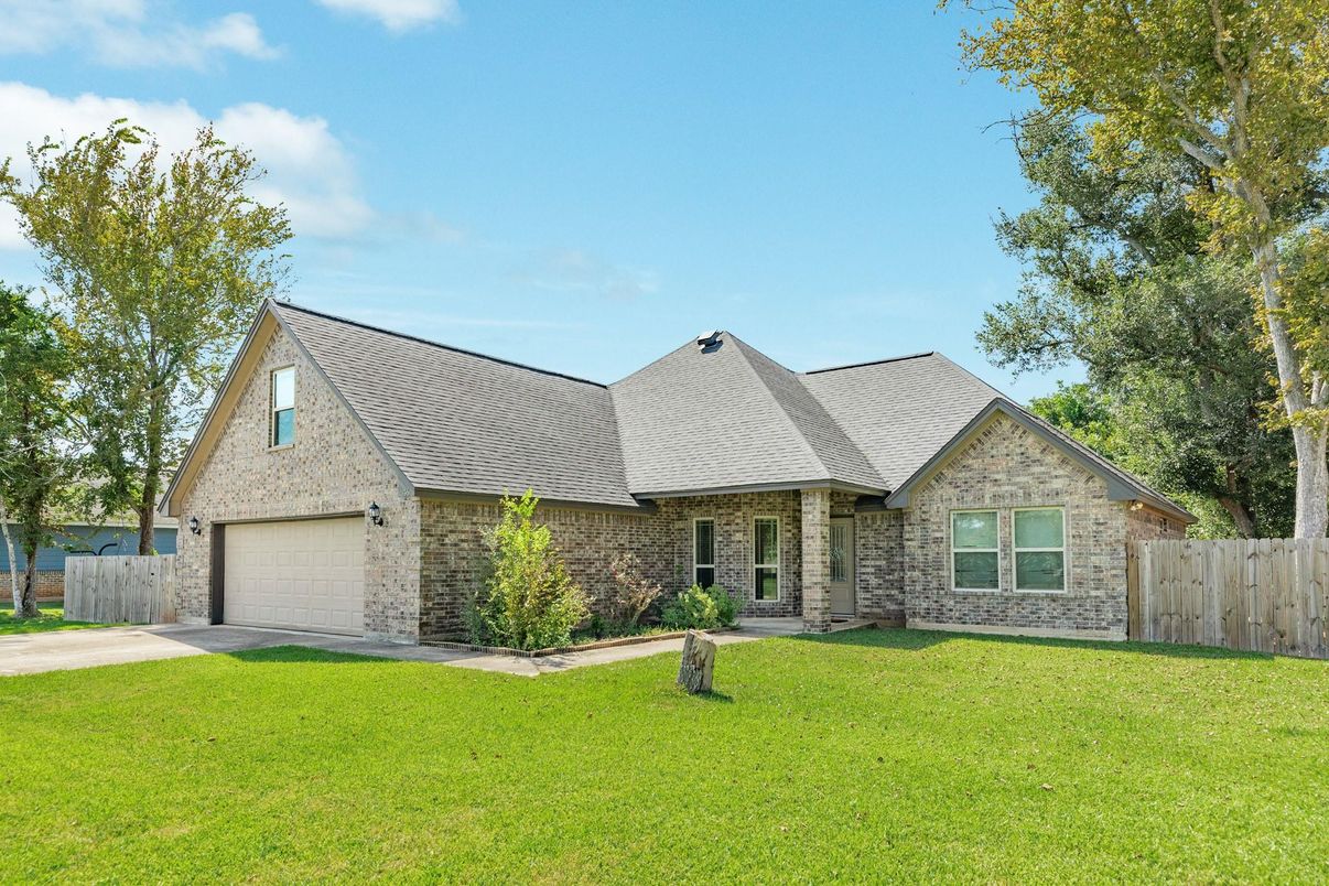 Attached, Backyard, Exterior, Facade, Brick Facade, Brick Traditional