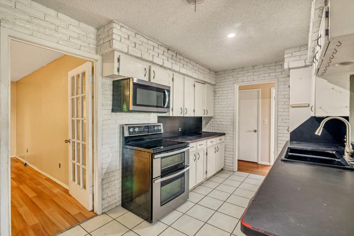 Interior, Kitchen, Recessed Lighting, Stone Walls, Wood Texture Flooring