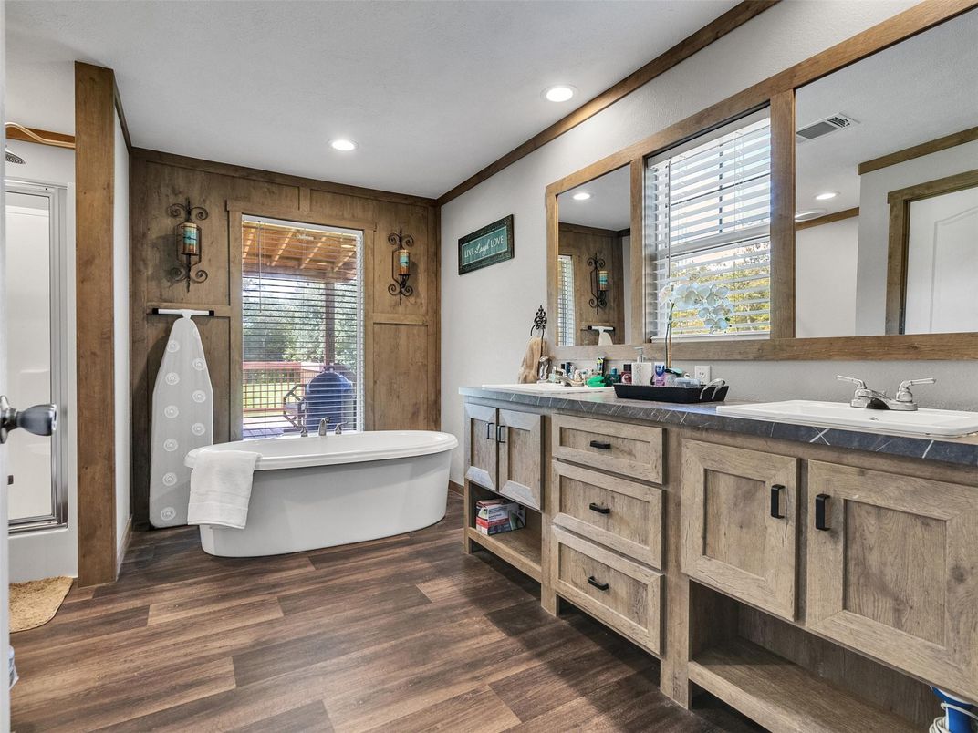 Bathroom, Dual Sink Vanities, Free Standing Baths, Interior, Recessed Lighting, Wood Texture Flooring