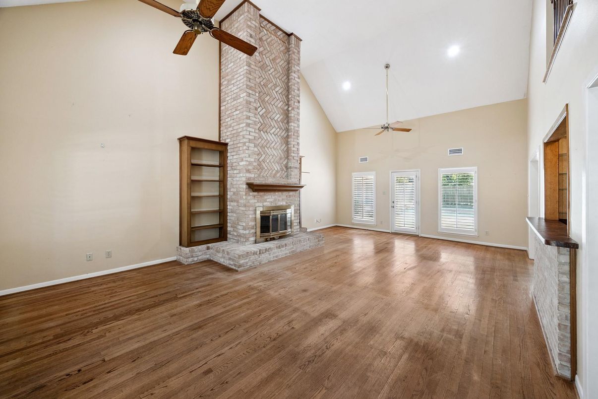 Empty room, Fireplace, Interior, Recessed Lighting, Wood Texture Flooring