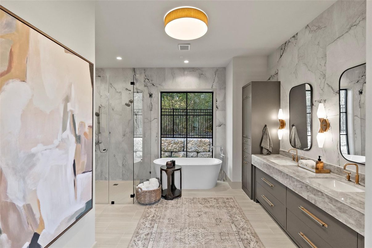 Bathroom, Dual Sink Vanities, Free Standing Baths, Glass Shower, Interior, Marble Walls, Recessed Lighting