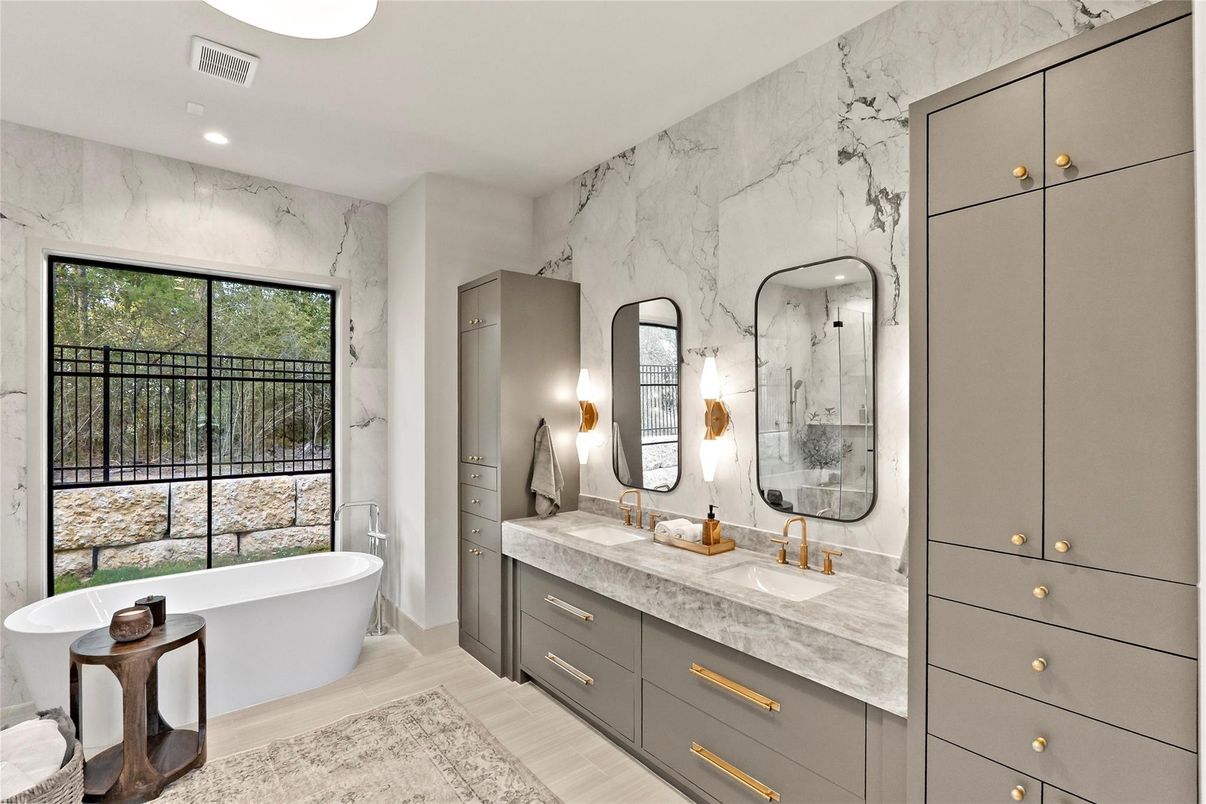 Bathroom, Dual Sink Vanities, Free Standing Baths, Interior, Marble Walls, Recessed Lighting, Wood Texture Flooring