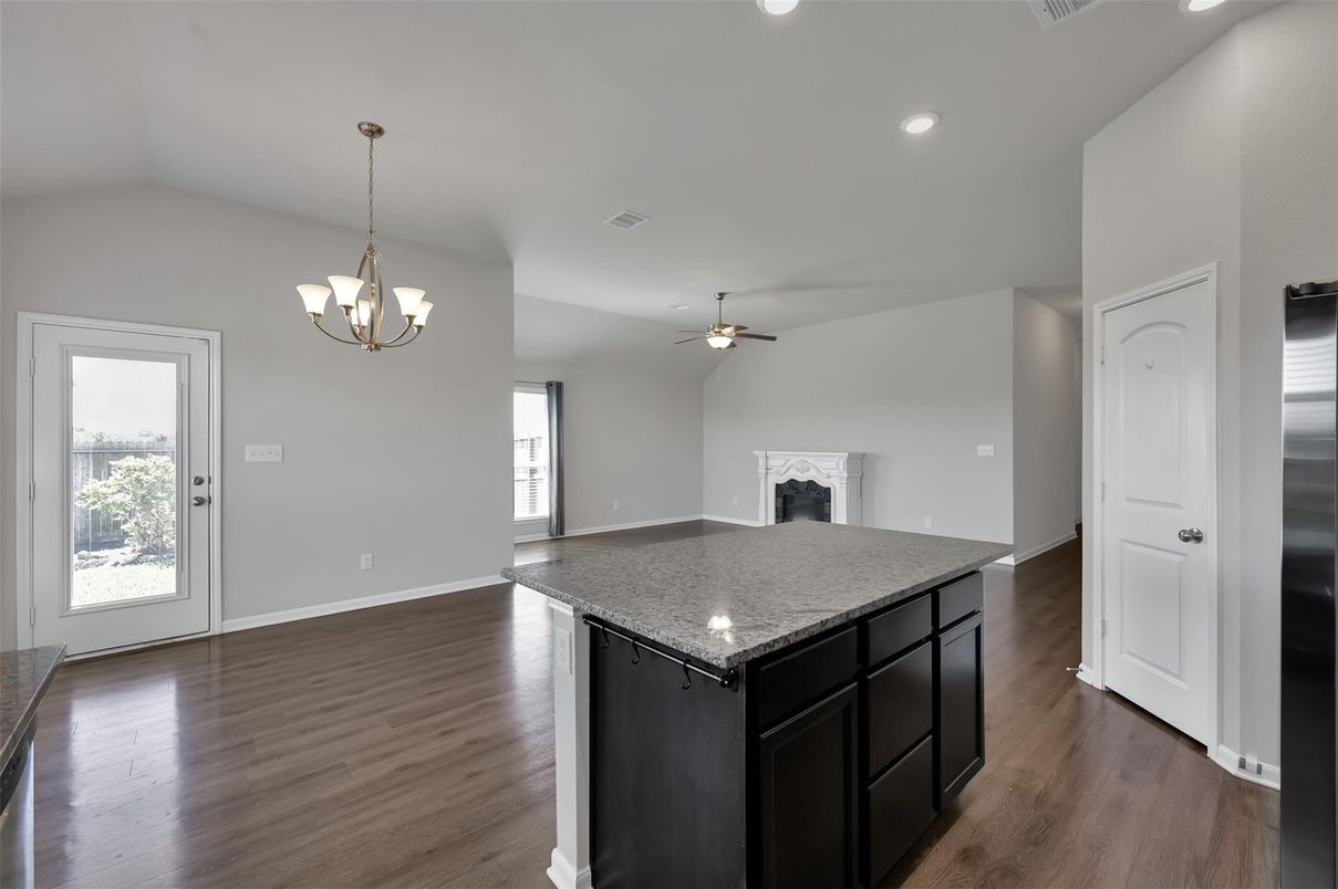 Chandelier, Empty room, Fireplace, Interior, Recessed Lighting, Wood Texture Flooring