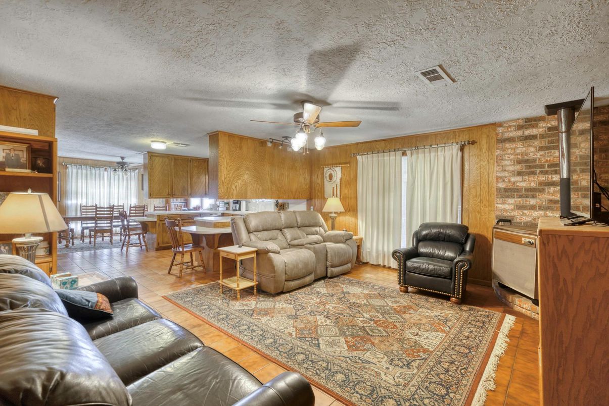 Dining room, Fireplace, Interior, Kitchen, Living room, Stone Walls, Wood Texture Flooring