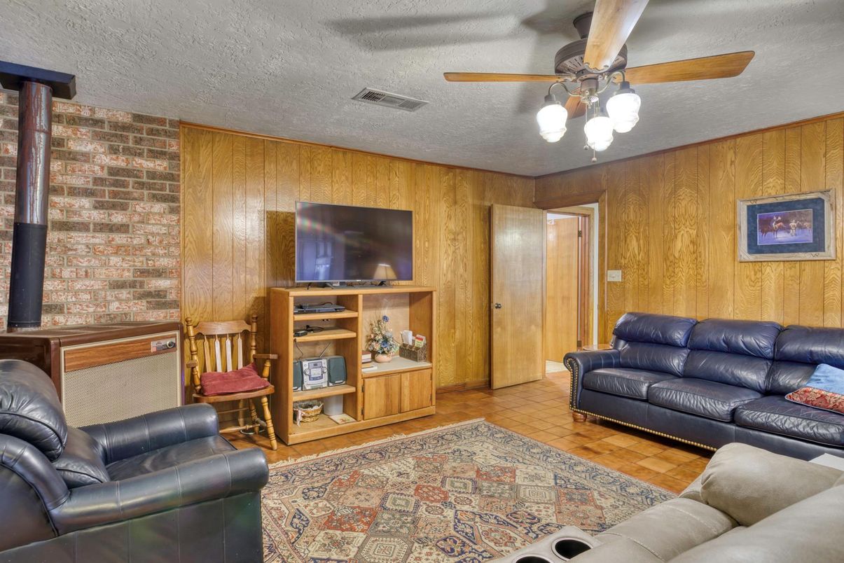 Fireplace, Interior, Living room, Stone Walls, Wood Texture Flooring, Wooden Walls