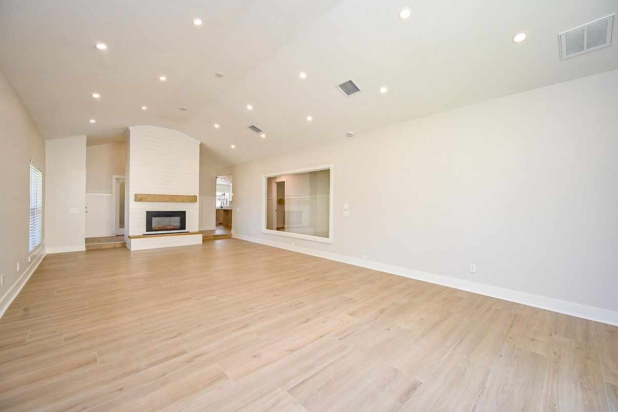Empty room, Fireplace, Interior, Recessed Lighting, Wood Texture Flooring
