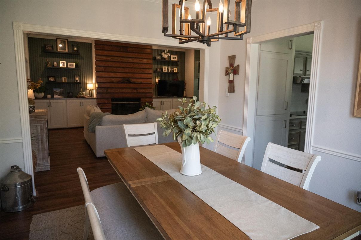 Chandelier, Dining room, Fireplace, Interior, Wood Texture Flooring, Wooden Walls