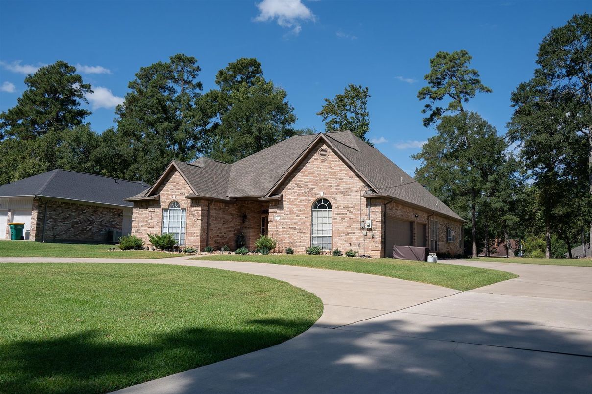 Attached, Backyard, Exterior, Facade, Brick Facade, Brick Traditional