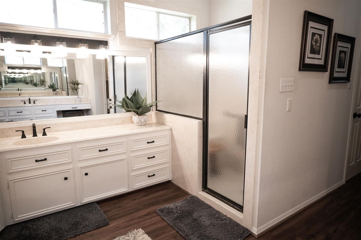 Bathroom, Dual Sink Vanities, Glass Shower, Interior, Wood Texture Flooring