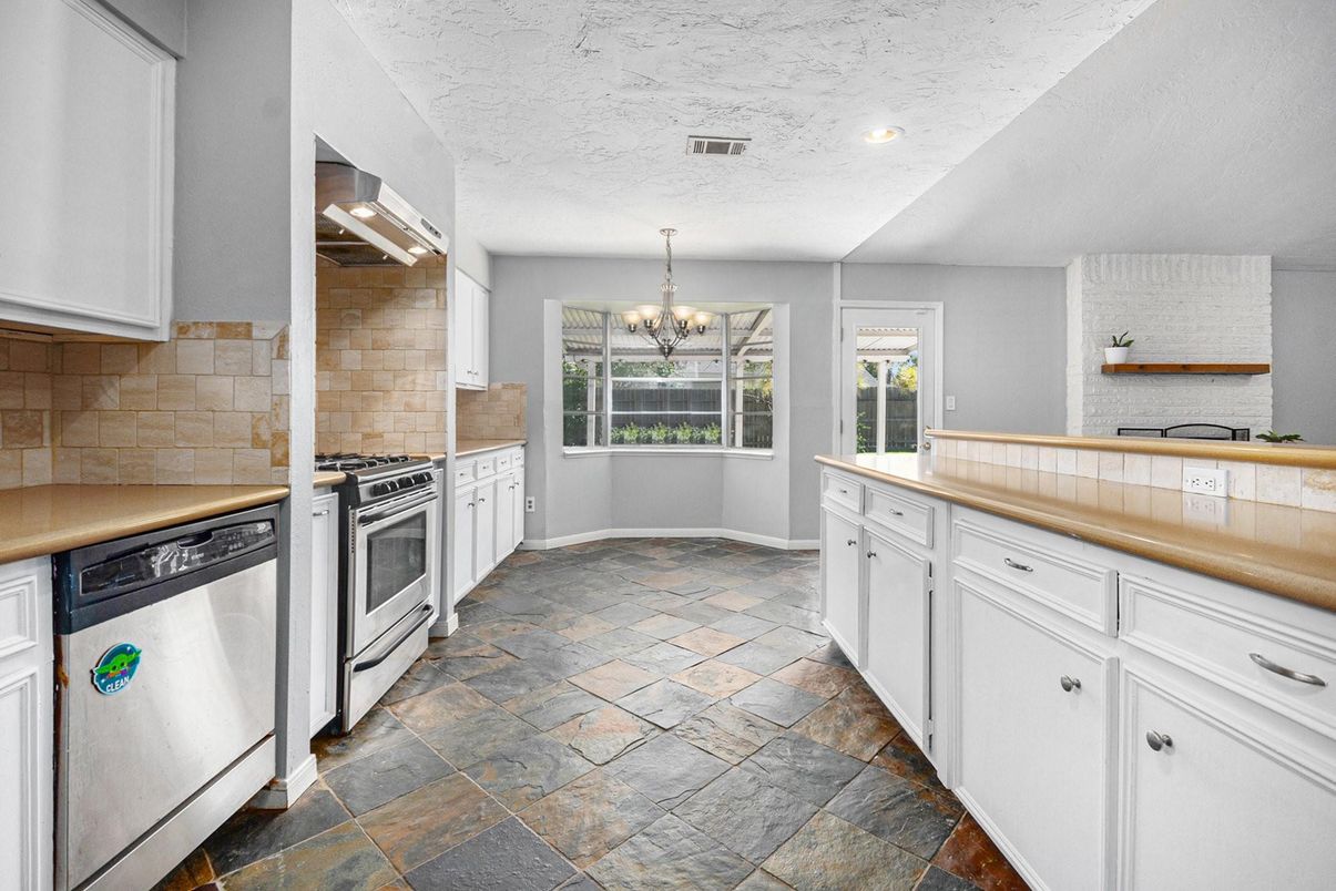 Chandelier, Interior, Kitchen, Recessed Lighting, Stainless Steel Appliances, Stone Walls