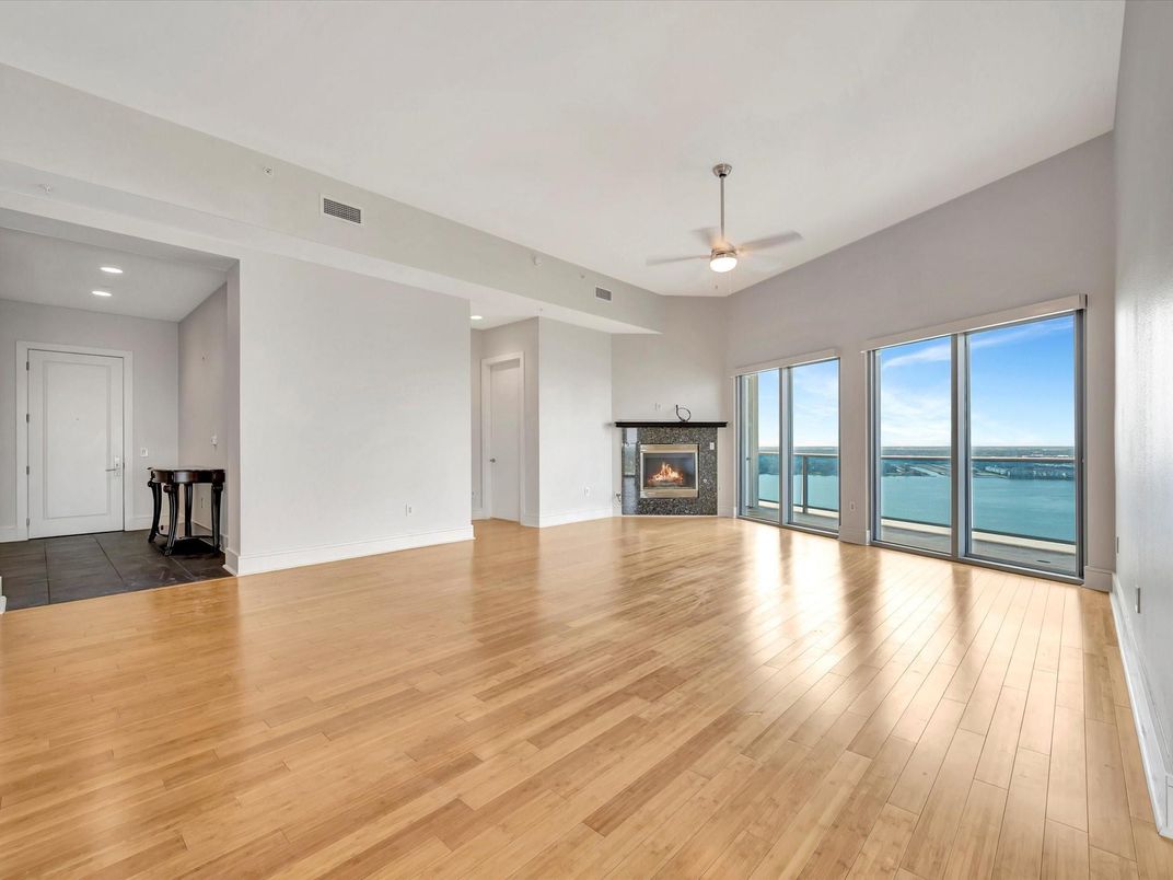 Empty room, Fireplace, Interior, Recessed Lighting, Water, Wood Texture Flooring