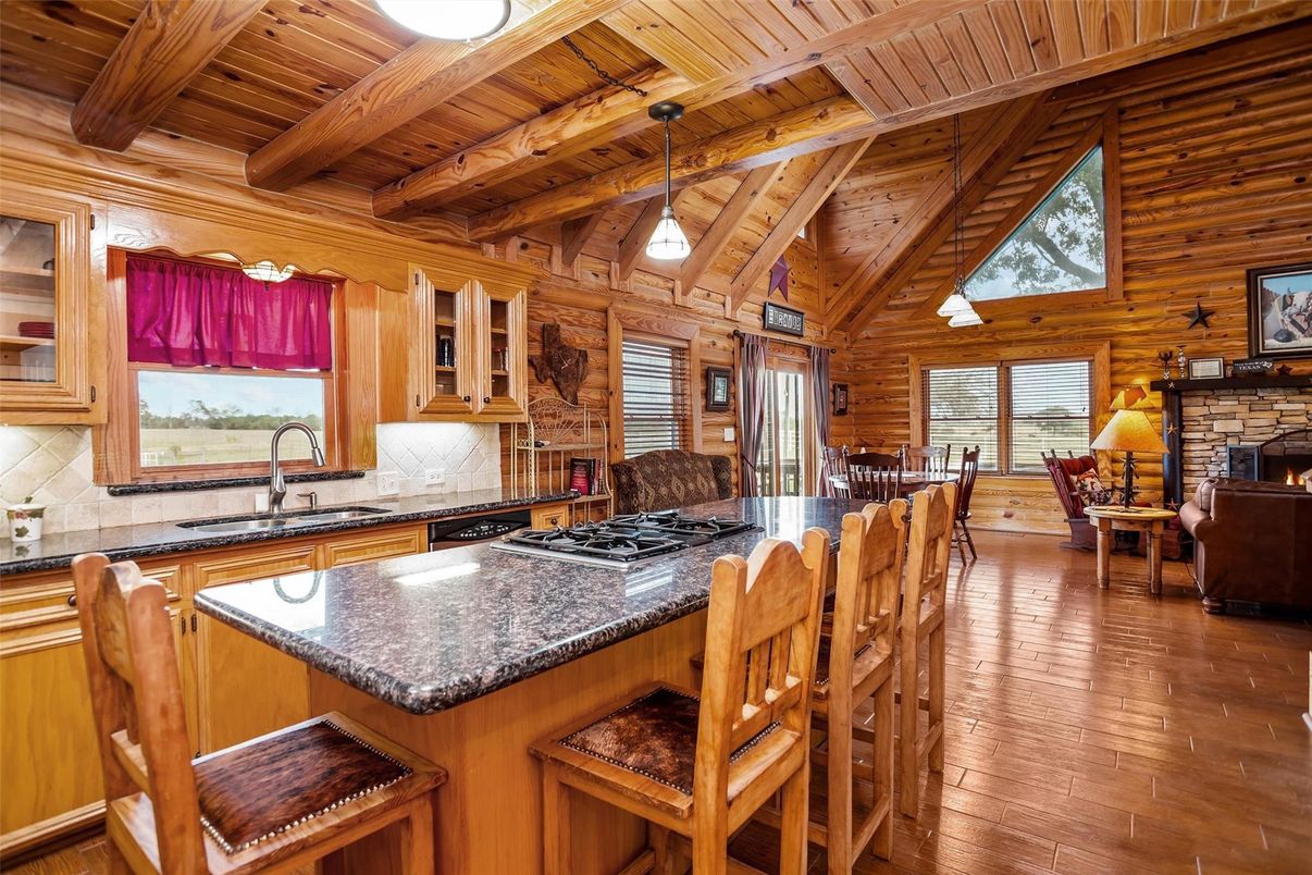 Dining room, Fireplace, Interior, Kitchen, Pendant Lights, Wooden Beams, Wooden Ceilings, Wood Texture Flooring, Wooden Walls