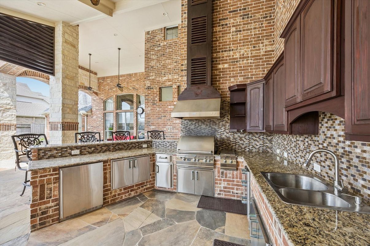 Interior, Kitchen, Pendant Lights, Stainless Steel Appliances, Stone Walls