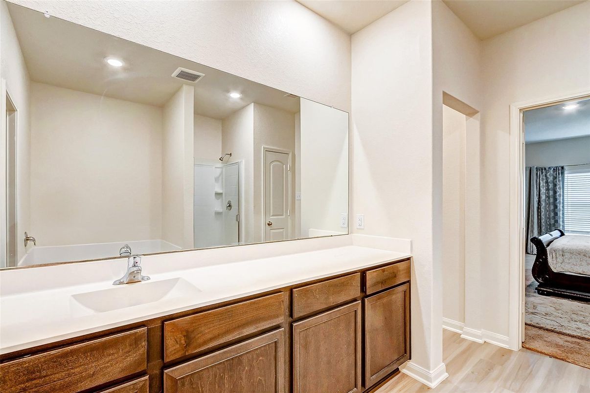 Bathroom, Dual Sink Vanities, Interior, Recessed Lighting, Wood Texture Flooring